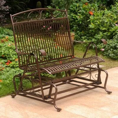 Nocona Patio Glider Bench Fleur De Lis Living Color: Bronze