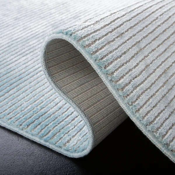 Safavieh Dream Turquoise/Grey 5 ft. x 8 ft. Abstract Area Rug