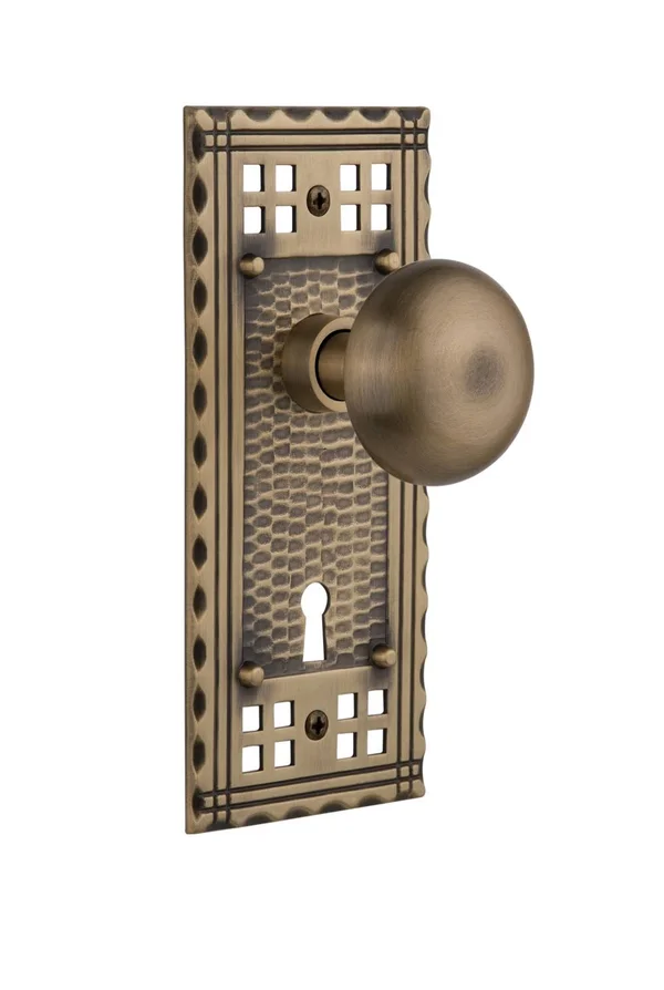 Nostalgic Warehouse 710142 New York Passage Door Knob with Craftsman Plate Antique Brass